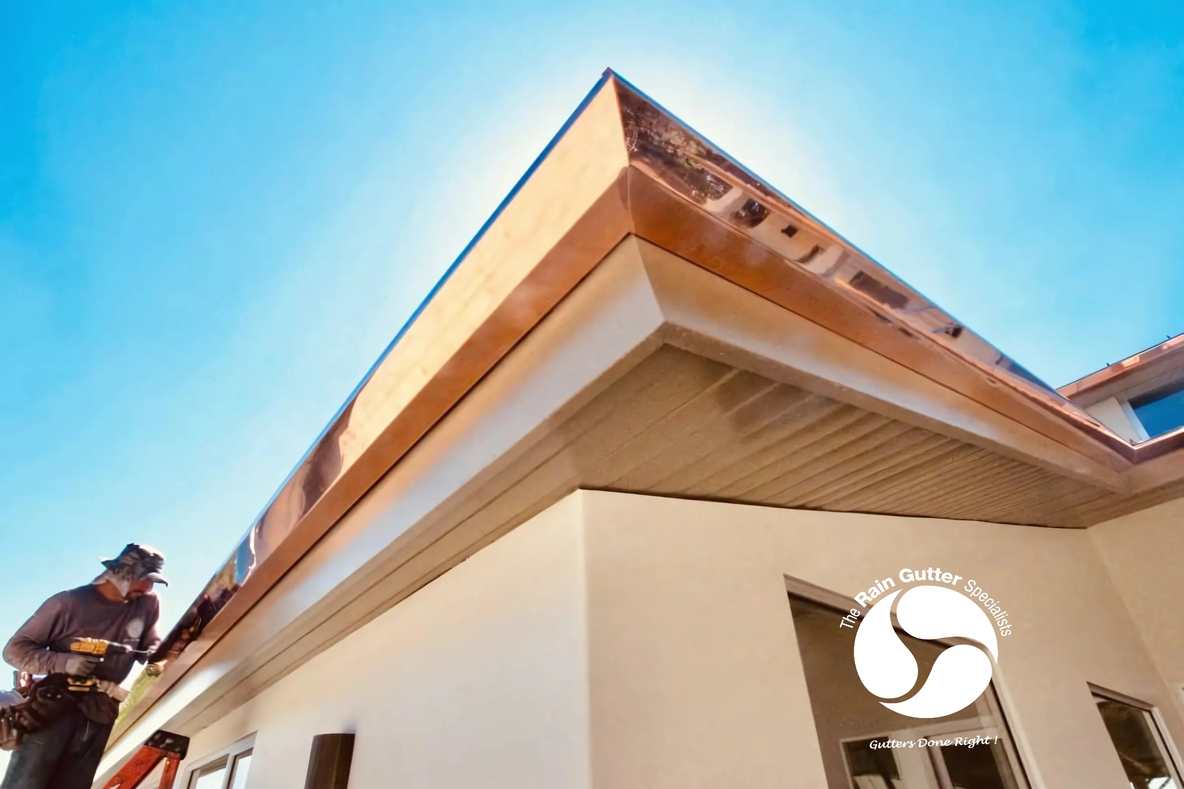 Custom copper rain gutters enhancing luxury Malibu property exterior