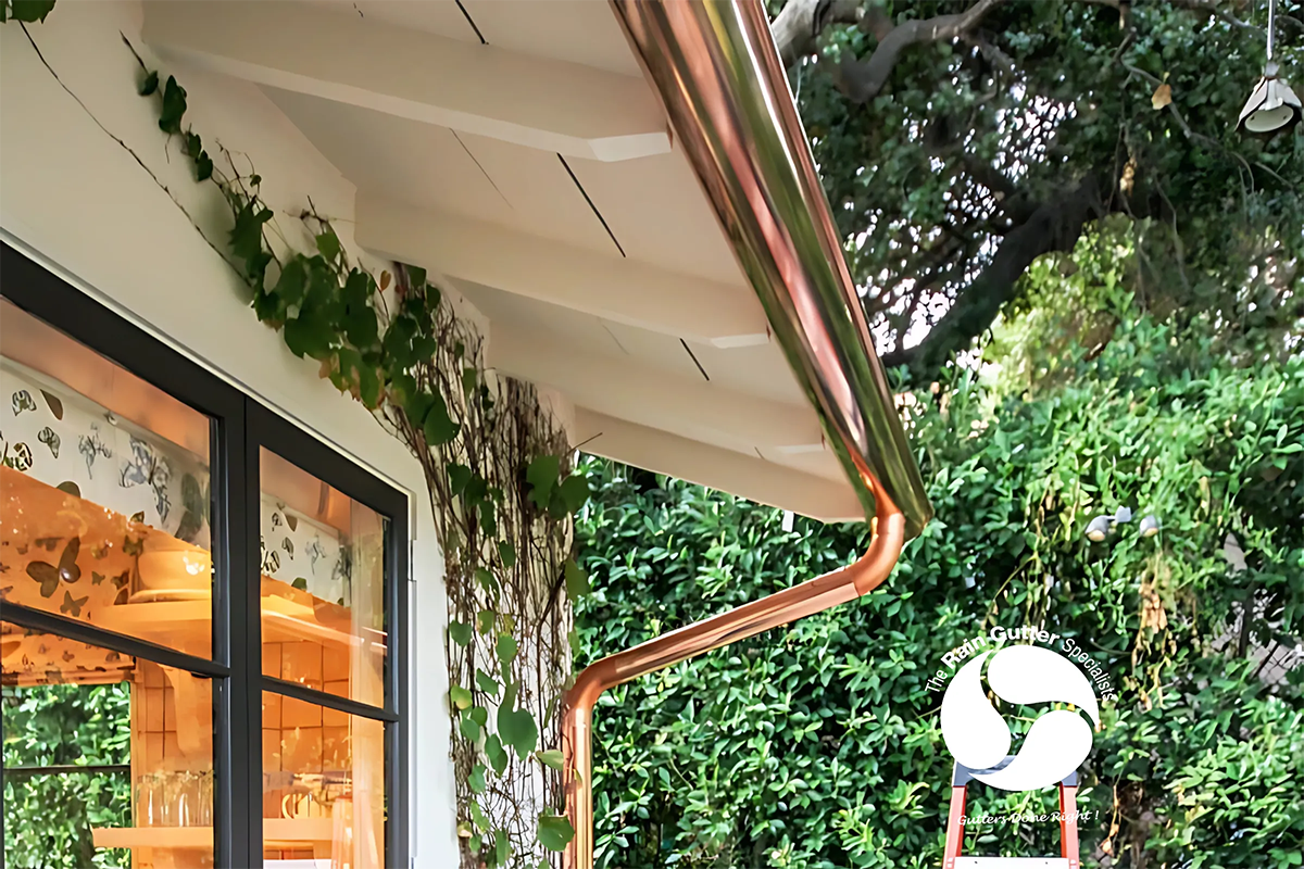 Half round rain gutters for Malibu coastal homes